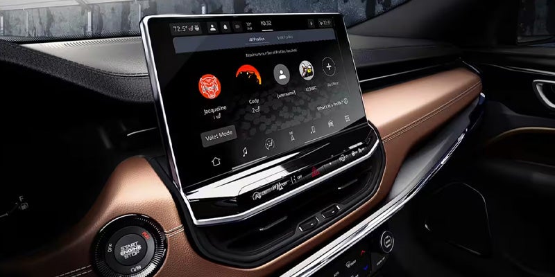 Close-up view of a vehicle interior showing a large touchscreen display